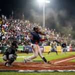 Batter_hitting_baseball_in_game_20261023103054