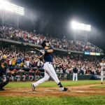 Batter_hitting_baseball_in_game_6064aab5
